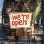 u7934255624_a_photo_of_a_glass_door_to_a_cafe_with_a_red_were_9bef367b-cdf5-4f70-9f73-beb77a7889b5_0